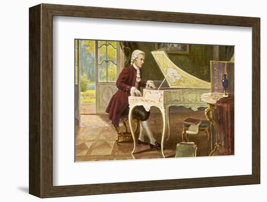 Wolfgang Amadeus Mozart the Austrian Composer Playing an Ornate Harpsichord-T. Beck-Framed Photographic Print