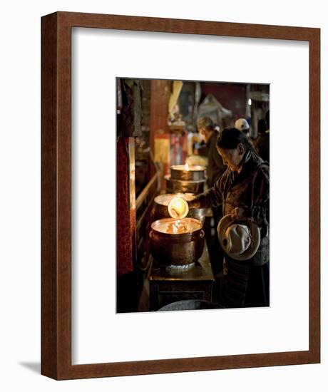 Woman Adding the Melting Yak Butter from Her Lamp to Those of the Temple, Bharkor, Tibet-Don Smith-Framed Photographic Print