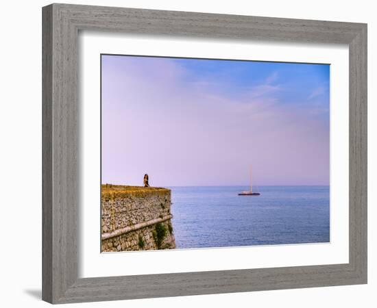 Woman alone at sunset next to the sea, Antibes, Cote d'Azur, French Riviera, France, Mediterranean,-Alexandre Rotenberg-Framed Photographic Print