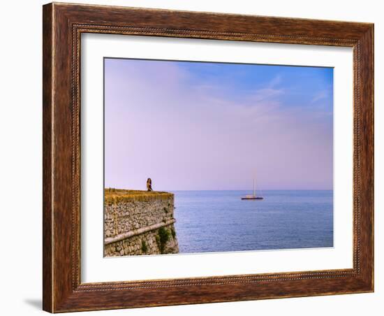 Woman alone at sunset next to the sea, Antibes, Cote d'Azur, French Riviera, France, Mediterranean,-Alexandre Rotenberg-Framed Photographic Print