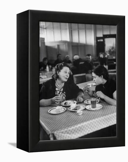 Woman and Her Daughter Eating in a Restaurant-Lisa Larsen-Framed Premier Image Canvas