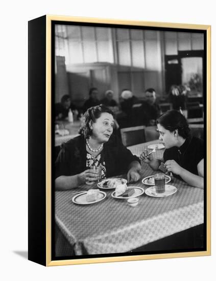 Woman and Her Daughter Eating in a Restaurant-Lisa Larsen-Framed Premier Image Canvas