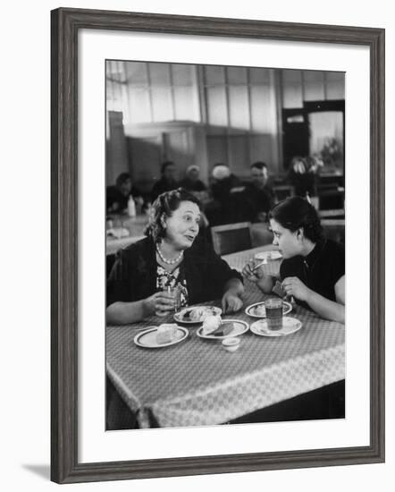 Woman and Her Daughter Eating in a Restaurant-Lisa Larsen-Framed Photographic Print