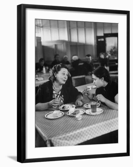 Woman and Her Daughter Eating in a Restaurant-Lisa Larsen-Framed Photographic Print