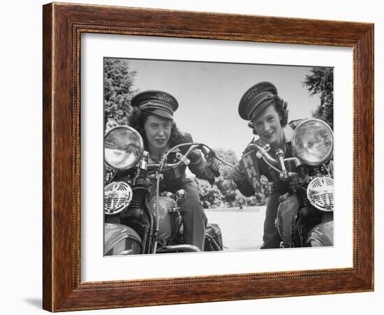 Woman and Her Daughter Sharing Interest in Motorcycle Racing-Sam Shere-Framed Photographic Print