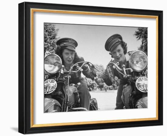 Woman and Her Daughter Sharing Interest in Motorcycle Racing-Sam Shere-Framed Photographic Print