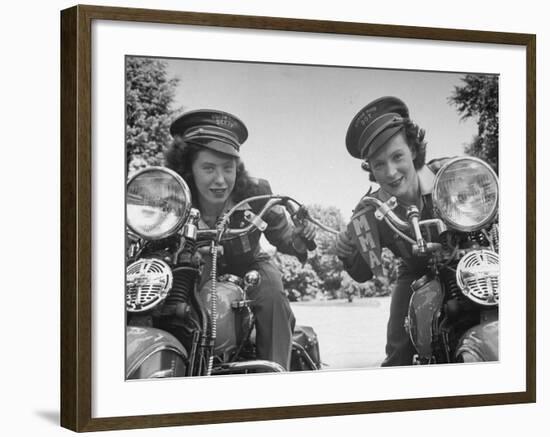 Woman and Her Daughter Sharing Interest in Motorcycle Racing-Sam Shere-Framed Photographic Print