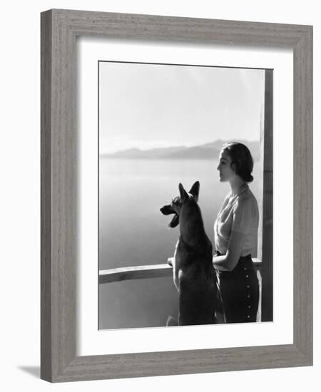 Woman and Her German Shepherd Overlooking a Lake-null-Framed Photo