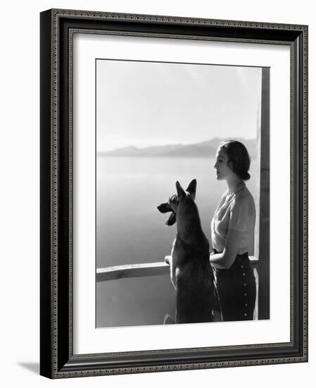Woman and Her German Shepherd Overlooking a Lake-null-Framed Photo