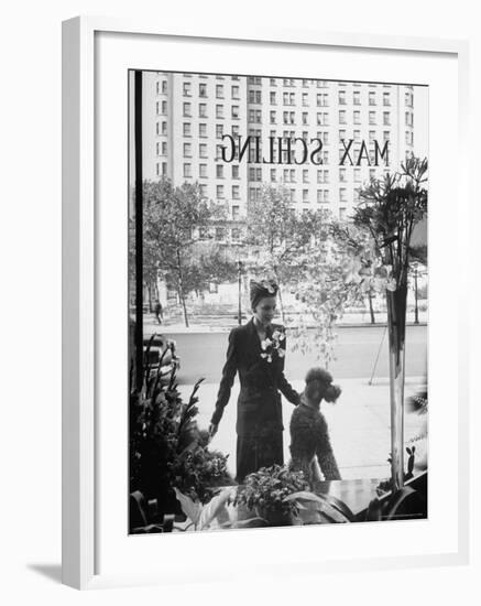 Woman and Her Pet Poodle Gazing at Window Display of Fifth Ave. Shop-Alfred Eisenstaedt-Framed Photographic Print