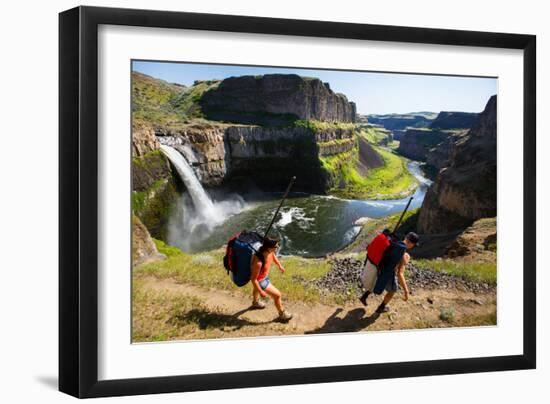 Woman And Man Wear Packs With SUP Gear, Hiking Into The Base Of Palouse Falls For An Afternoon-Ben Herndon-Framed Photographic Print