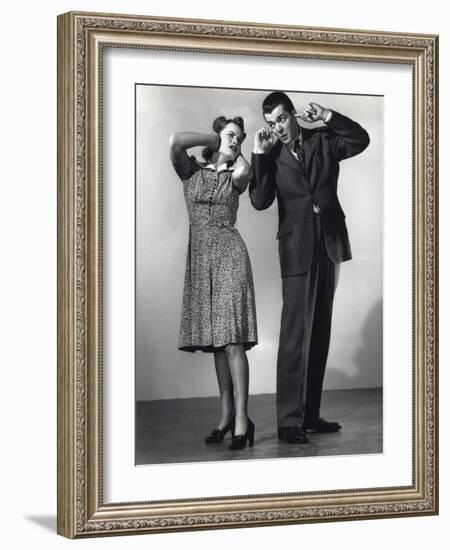 Woman and Man with Hands over Ears-Philip Gendreau-Framed Photographic Print