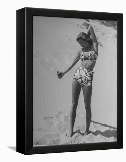 Woman Applying Suntan Lotion at the Beach-Peter Stackpole-Framed Premier Image Canvas