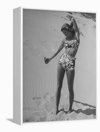 Woman Applying Suntan Lotion at the Beach-Peter Stackpole-Framed Premier Image Canvas