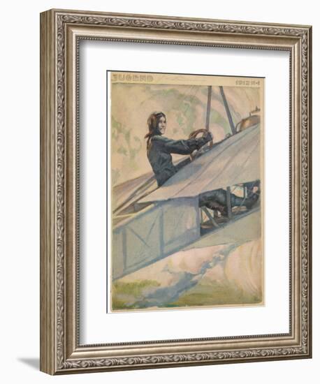 Woman at the Controls of an Early Aeroplane-null-Framed Art Print