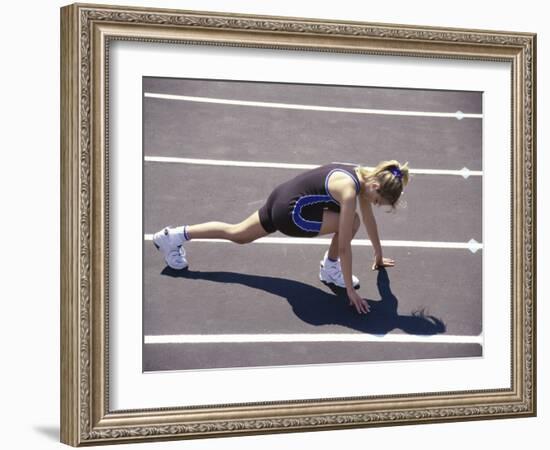 Woman at the Starting Pose on a Running Track-null-Framed Photographic Print