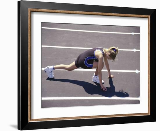 Woman at the Starting Pose on a Running Track-null-Framed Photographic Print