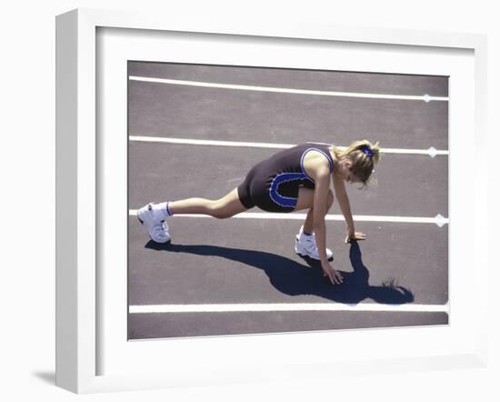 Woman at the Starting Pose on a Running Track-null-Framed Photographic Print