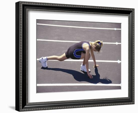 Woman at the Starting Pose on a Running Track-null-Framed Photographic Print