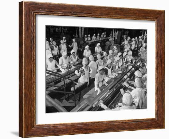 Woman at Work at Pineapple Trimming Table, Removing Skin and Core of Fruit for Dole Corporation-Eliot Elisofon-Framed Photographic Print