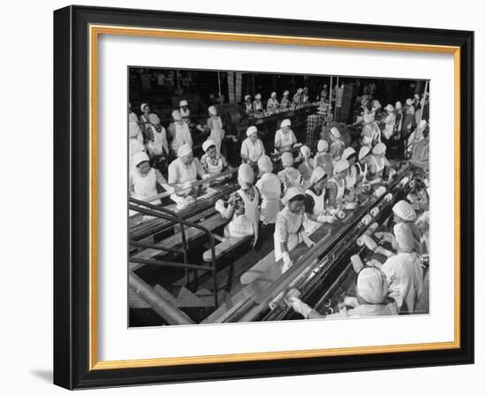 Woman at Work at Pineapple Trimming Table, Removing Skin and Core of Fruit for Dole Corporation-Eliot Elisofon-Framed Photographic Print