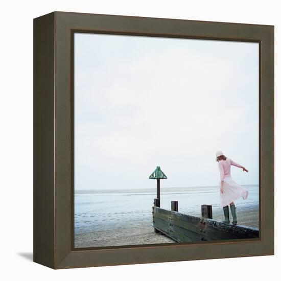 Woman Balancing on a Breakwater-null-Framed Premier Image Canvas