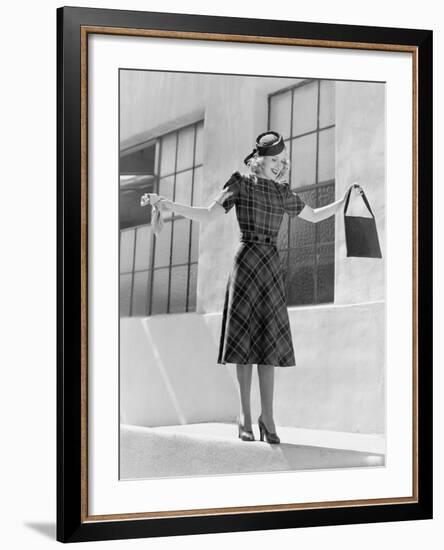 Woman Balancing on Edge of Wall-null-Framed Photo