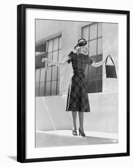 Woman Balancing on Edge of Wall-null-Framed Photo