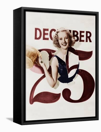 Woman Bursting Through Calendar on Christmas Day-null-Framed Stretched Canvas