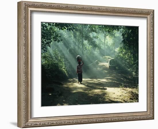Woman Carrying Coconuts to Market, Peliatan, Bali, Indonesia, Southeast Asia-James Green-Framed Photographic Print