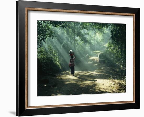 Woman Carrying Coconuts to Market, Peliatan, Bali, Indonesia, Southeast Asia-James Green-Framed Photographic Print