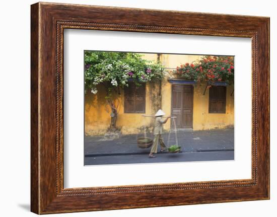 Woman Carrying Vegetables in Street, Hoi An, Quang Nam, Vietnam, Indochina, Southeast Asia, Asia-Ian Trower-Framed Photographic Print