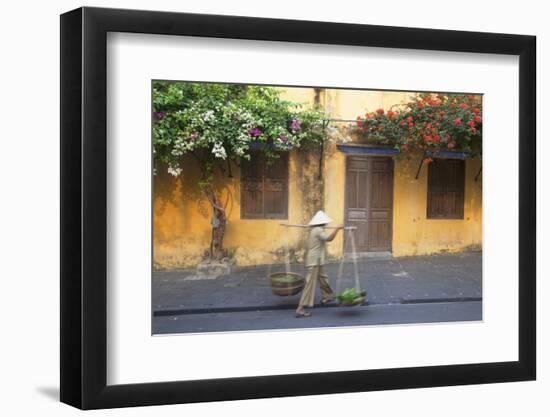 Woman Carrying Vegetables in Street, Hoi An, Quang Nam, Vietnam, Indochina, Southeast Asia, Asia-Ian Trower-Framed Photographic Print