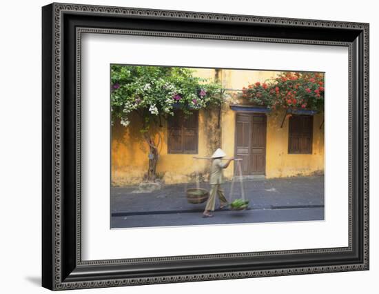 Woman Carrying Vegetables in Street, Hoi An, Quang Nam, Vietnam, Indochina, Southeast Asia, Asia-Ian Trower-Framed Photographic Print