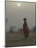 Woman Carrying Water Jar in Sand Storm, Thar Desert, Rajasthan, India-Keren Su-Mounted Photographic Print