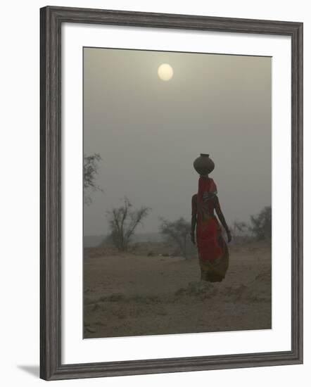 Woman Carrying Water Jar in Sand Storm, Thar Desert, Rajasthan, India-Keren Su-Framed Photographic Print