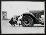 Woman Changing Flat Tire on Car-H. Armstrong Roberts-Framed Photographic Print