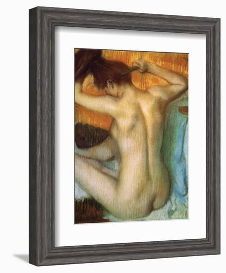 Woman Combing Her Hair-Edgar Degas-Framed Art Print