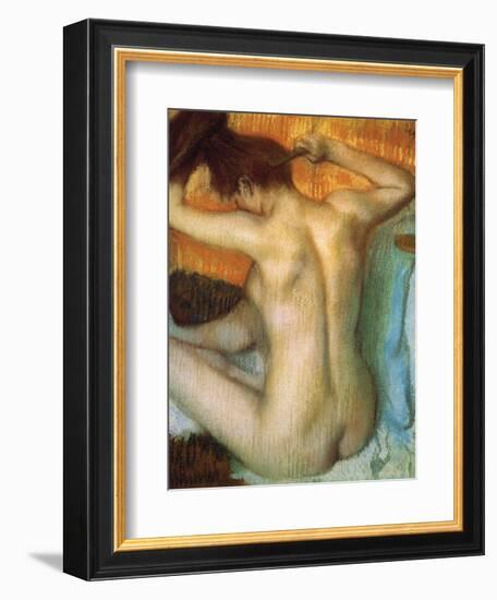 Woman Combing Her Hair-Edgar Degas-Framed Art Print