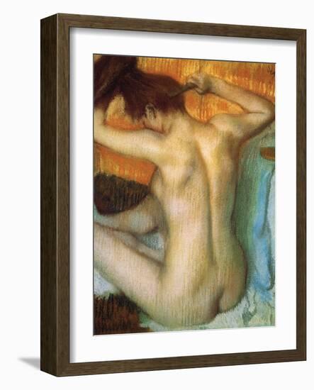 Woman Combing Her Hair-Edgar Degas-Framed Art Print