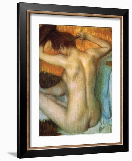 Woman Combing Her Hair-Edgar Degas-Framed Art Print