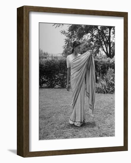 Woman Demonstrating How to Put on an Indian Sari-null-Framed Photographic Print