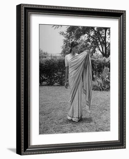 Woman Demonstrating How to Put on an Indian Sari-null-Framed Photographic Print