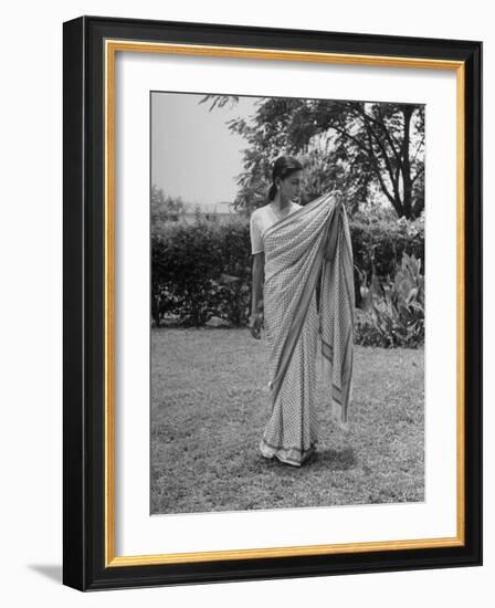 Woman Demonstrating How to Put on an Indian Sari-null-Framed Photographic Print