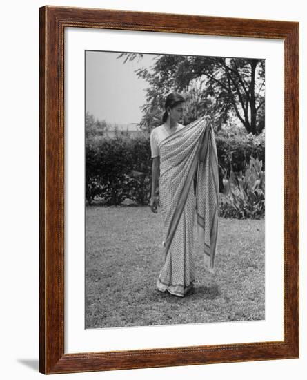 Woman Demonstrating How to Put on an Indian Sari-null-Framed Photographic Print