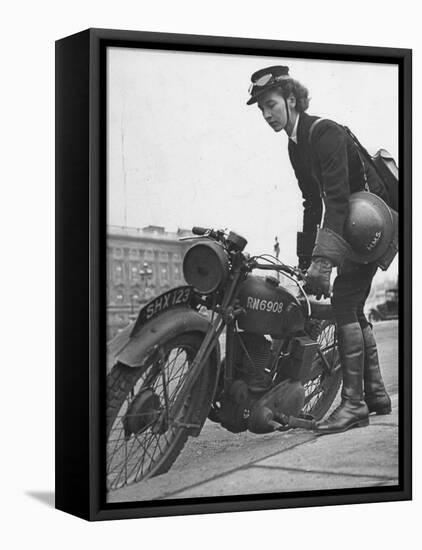 Woman Dispatch Rider Standing Beside Her Motorcycle-Hans Wild-Framed Premier Image Canvas