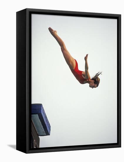 Woman Diver Flying Through the Air, California, USA-Paul Sutton-Framed Premier Image Canvas