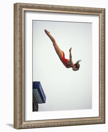 Woman Diver Flying Through the Air, California, USA-Paul Sutton-Framed Photographic Print