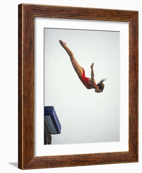 Woman Diver Flying Through the Air, California, USA-Paul Sutton-Framed Photographic Print