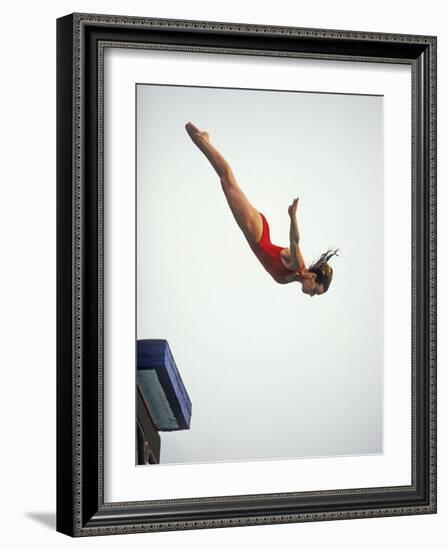 Woman Diver Flying Through the Air, California, USA-Paul Sutton-Framed Photographic Print